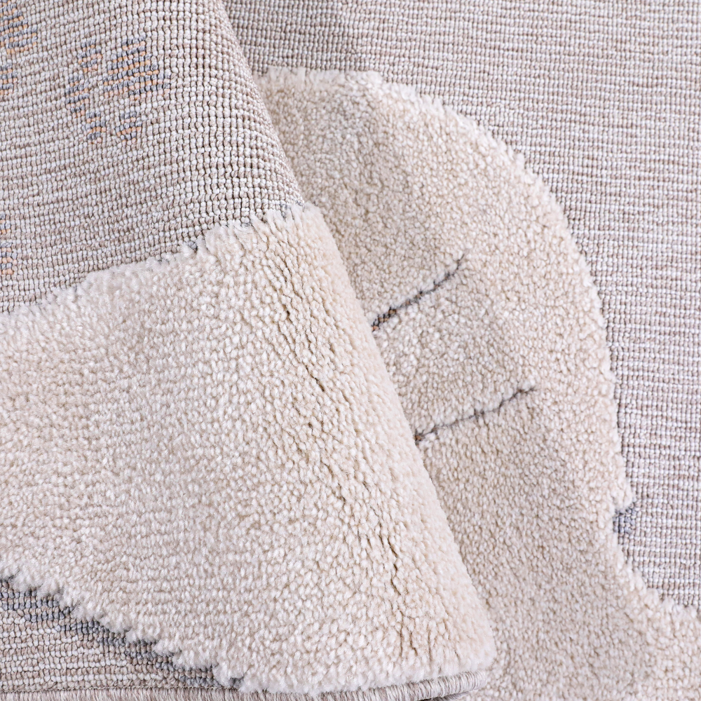 Gentle Illusions Cat Woven Rug close-up displaying soft fibers and paw print details.