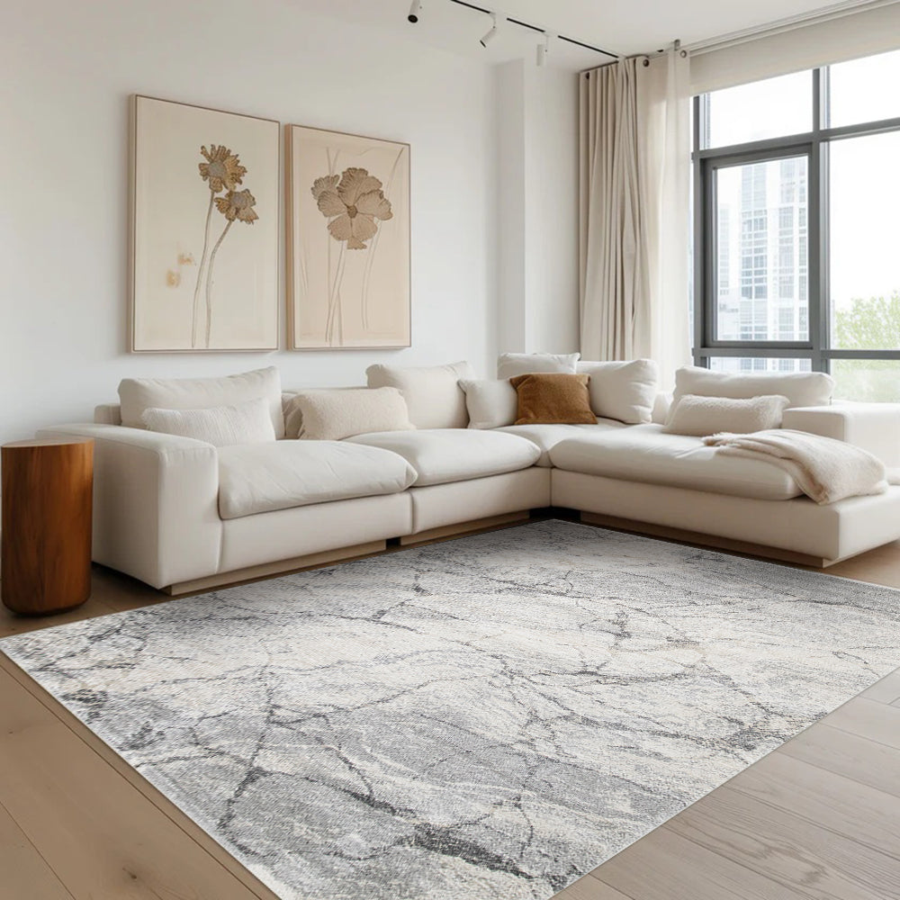 Modern living room with Drystan abstract gray marble rug and stylish white sofa